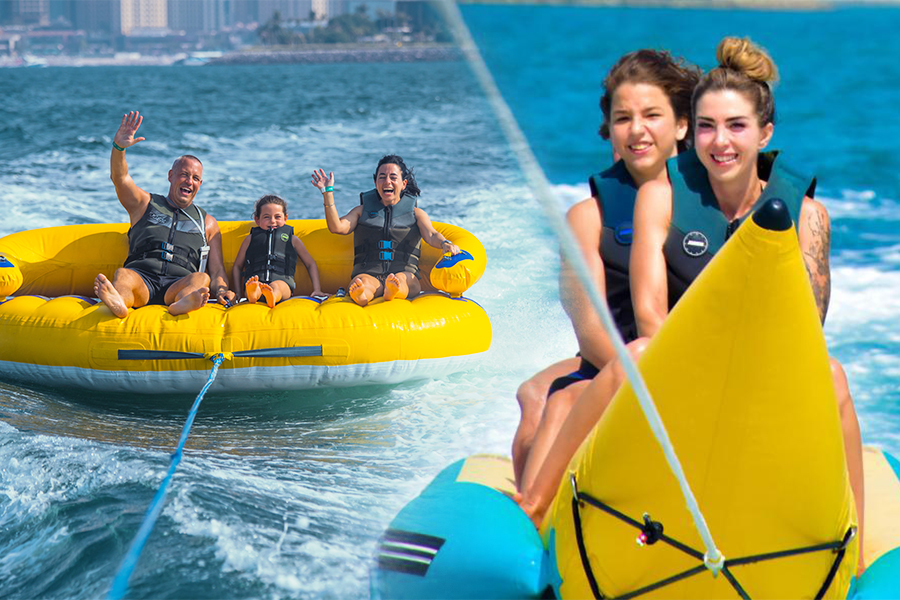 Boat activities in Dubai with banana and donut rides at Palm Jumeirah for fun water adventure experience