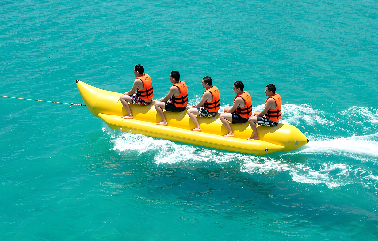 Banana boat fun in Dubai with exciting family water rides and donut boat adventure in Palm Jumeirah