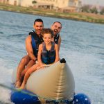 Friends and families enjoying different water adventures along the Dubai coastline