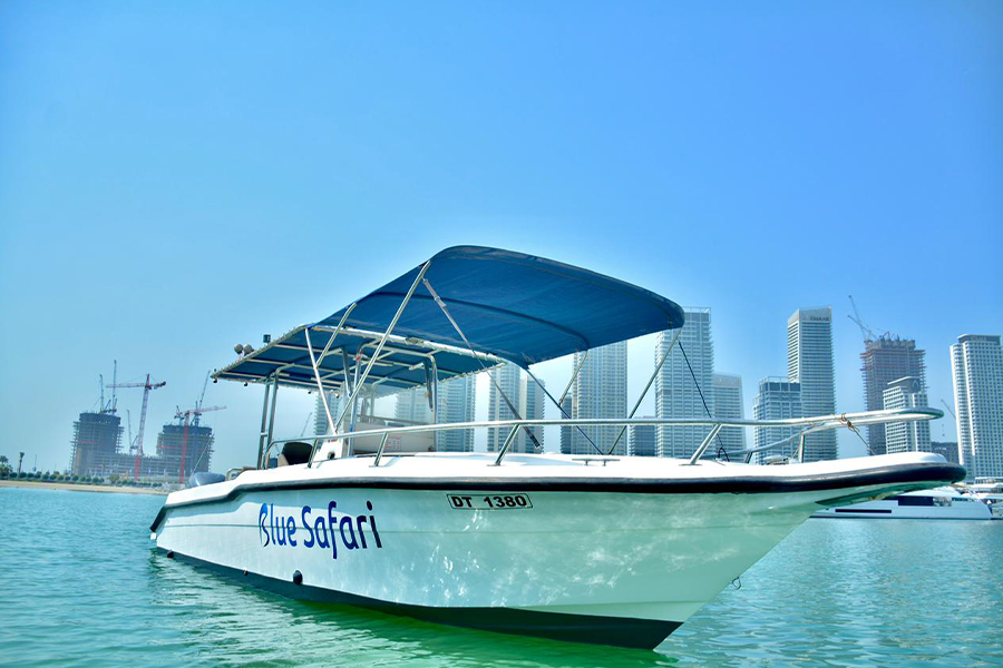 Anglers enjoying a fishing trip in Dubai while exploring open waters near Palm Jumeirah
