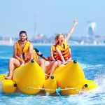 Friends and family enjoying memorable water adventures with fishing, jet skiing and banana boat rides in Dubai